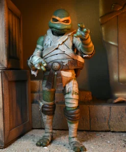 NECA x UNIVERSAL MONSTERS x TEENAGE MUTANT NINJA TURTLES - MICHELANGELO AS THE MUMMY ACTION FIGURE