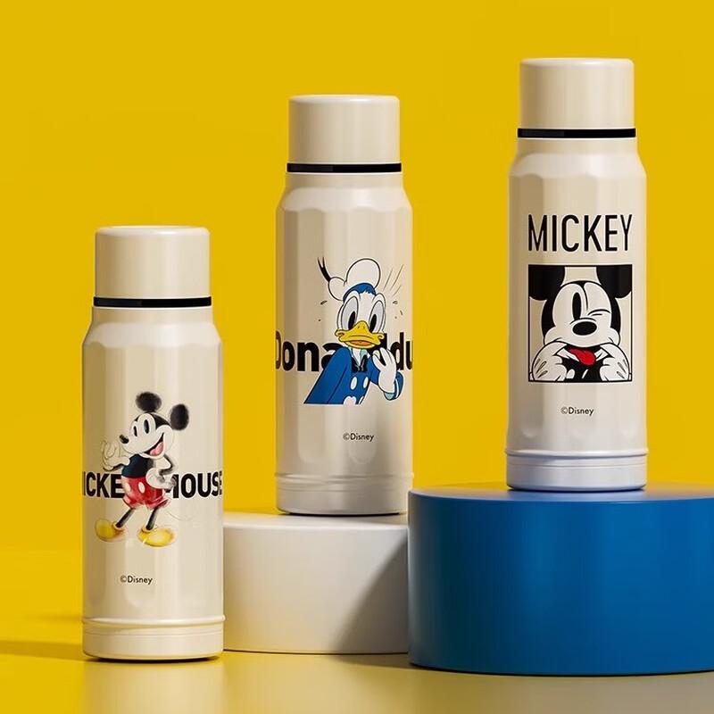 DISNEY 100TH ANNIVERSARY MICKEY AND DONALD TUMBLER